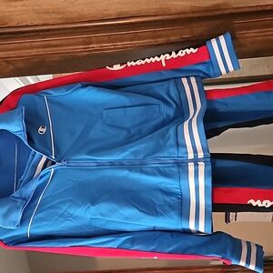 Womens Champion outfit. Light blue, red, white.